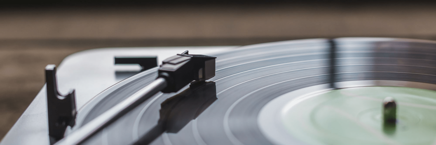 Close view of vinyl record and stylus