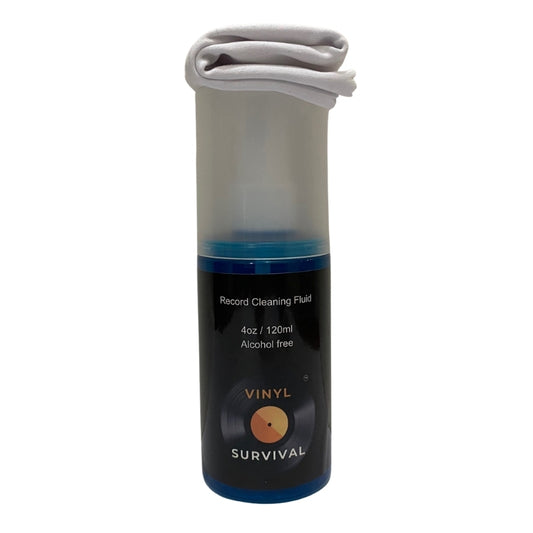 120ml (4 oz) bottle of vinyl survival record cleaning fluid with white cleaning cloth sitting on top of it, with white background