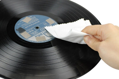 Wiping of  a microfibre cleaning cloth on a album